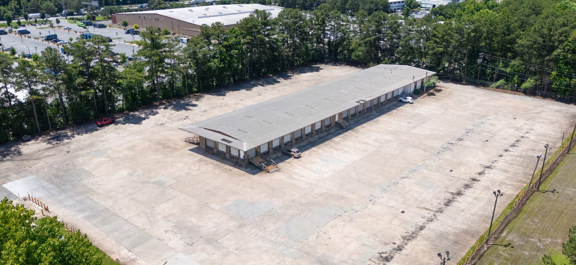 Aerial view of the truck terminal and full concrete yard at 3535 Best Friend Road, Doraville, Georgia