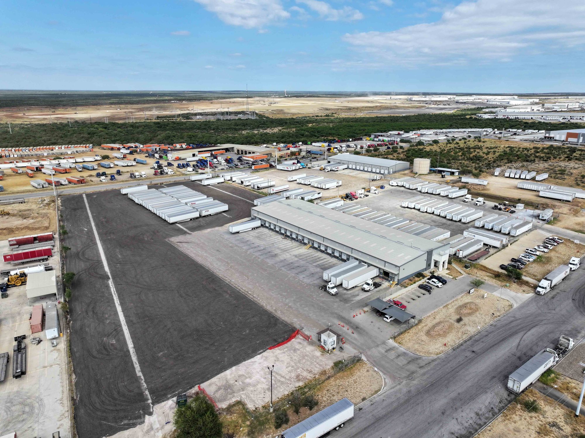 Aerial view of the cross-dock building and trailer yard at 1118 Beltway Parkway, Laredo, Texas